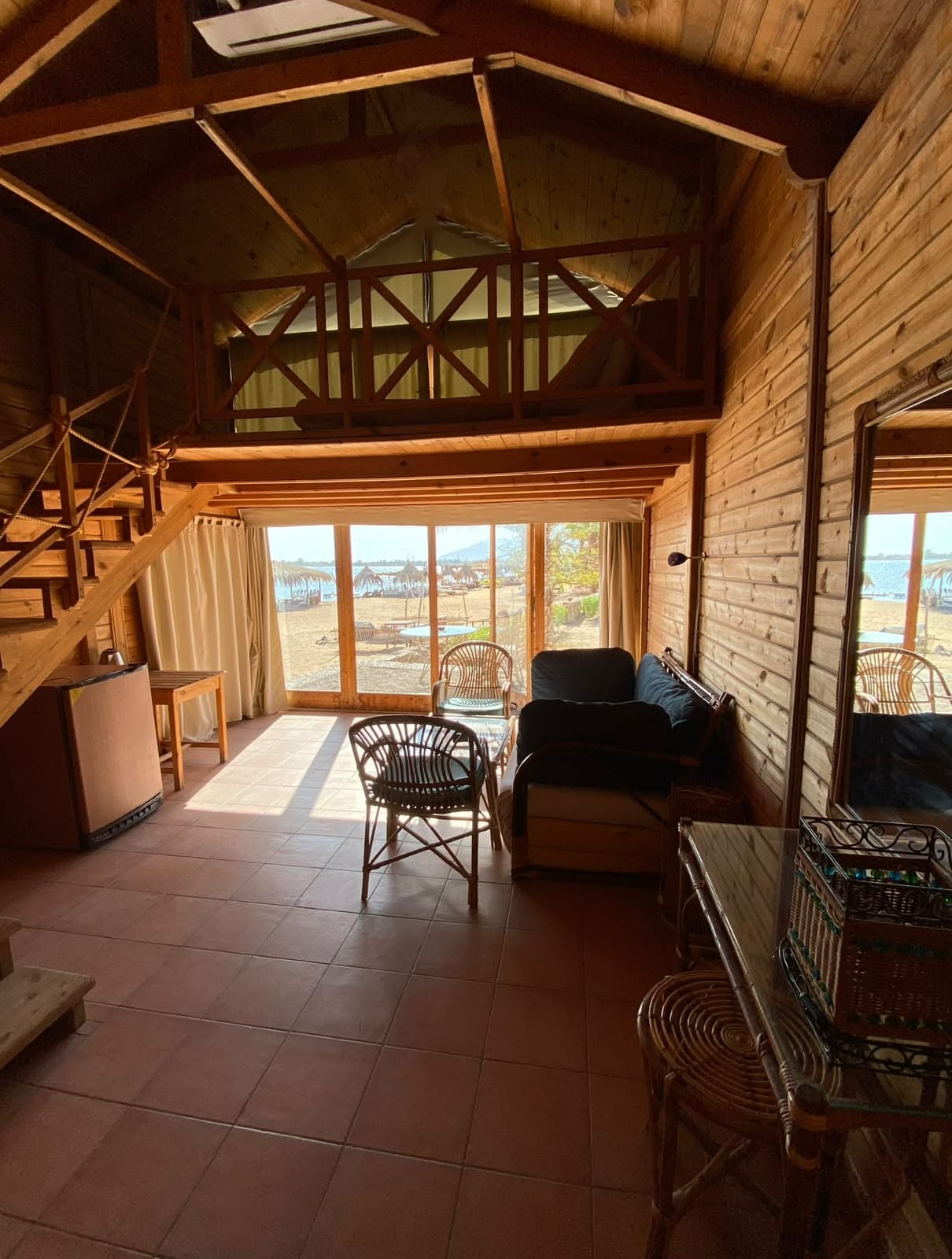 Interior of duplex wooden chalet at Nuweiba Lodge
