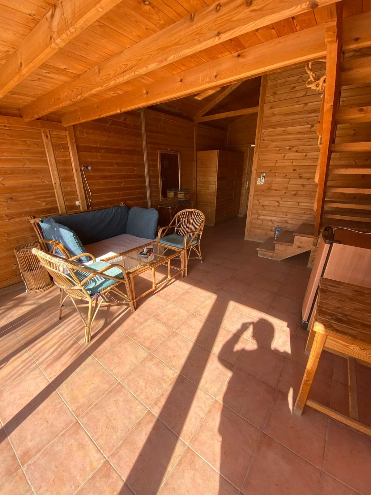 Chalet living room in warm sunlight